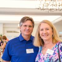 Two guests smiling at Naples 2019